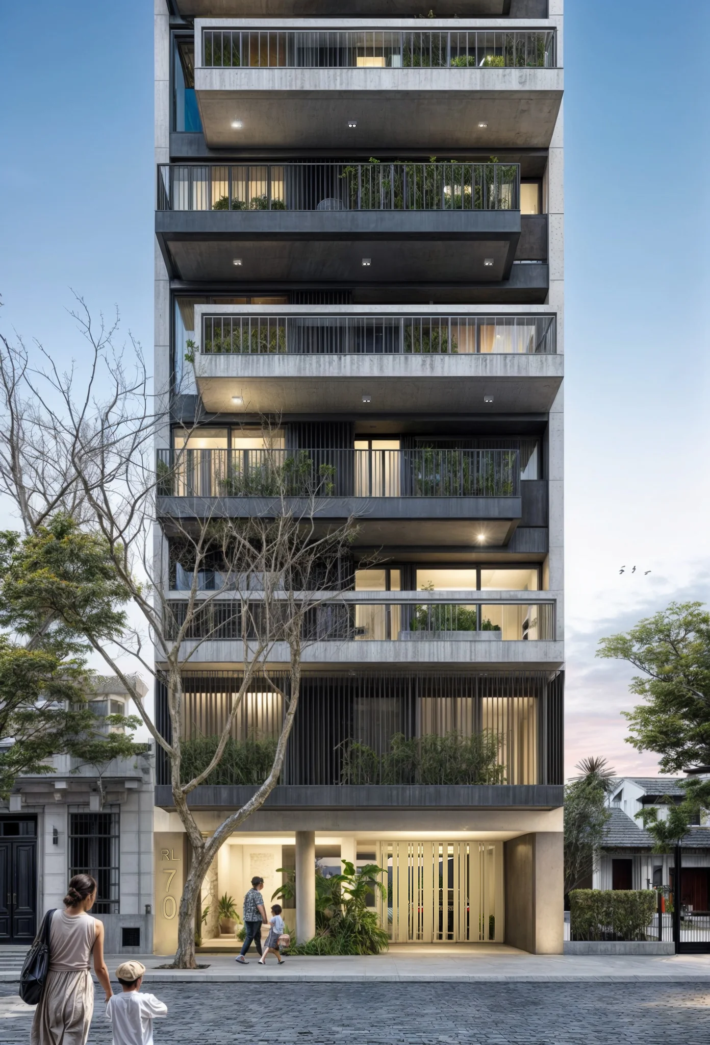 Fachada del edificio RL70, con el ingreso y el cartel de obra